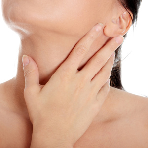 Stoc Foto tiroidiană - semne ale bolii la femei, cum să trateze