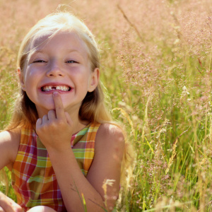 Fotos, wie man einen Zahn zu einem Kind entfernen
