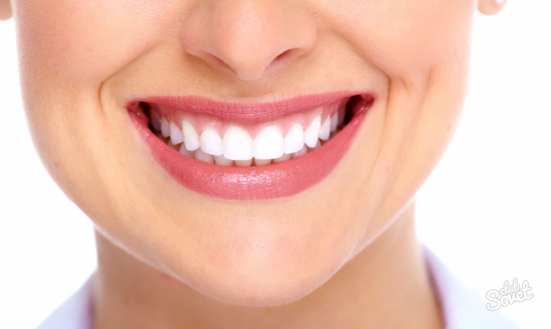 Як відновити емаль зубів