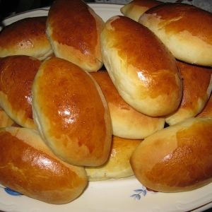 Stock Foto Pattails with potatoes in the oven - Recipe