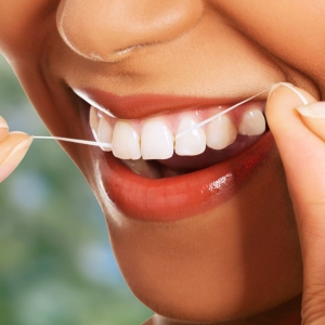 Фото как да се използват зъболекарски конец