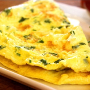 Stock Foto How to cook delicious omelet