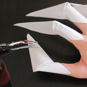 Como fazer garras do papel