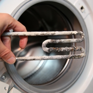 Cara membersihkan mesin cuci dari skala asam sitrat