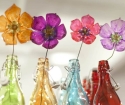 Como fazer flores de garrafas de plástico?