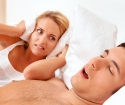 Why does a person snoring?