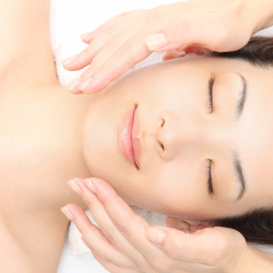 Stock Foto Japanese face massage asah