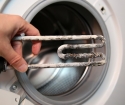 Cum să curățați mașina de spălat din acidul citric scară