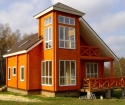Чем покрасить деревянный дом
