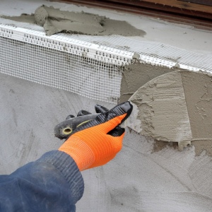 Photo how to plaster slope on windows
