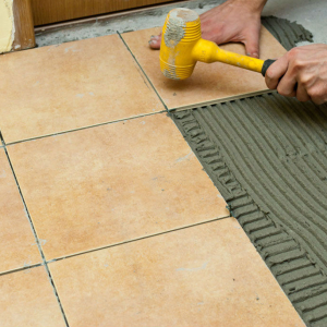 Photo How to put a tile on the floor