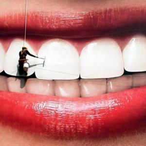 Як зробити зуби білими?