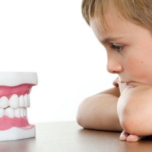 Perché un bambino scruta i denti in un sogno?