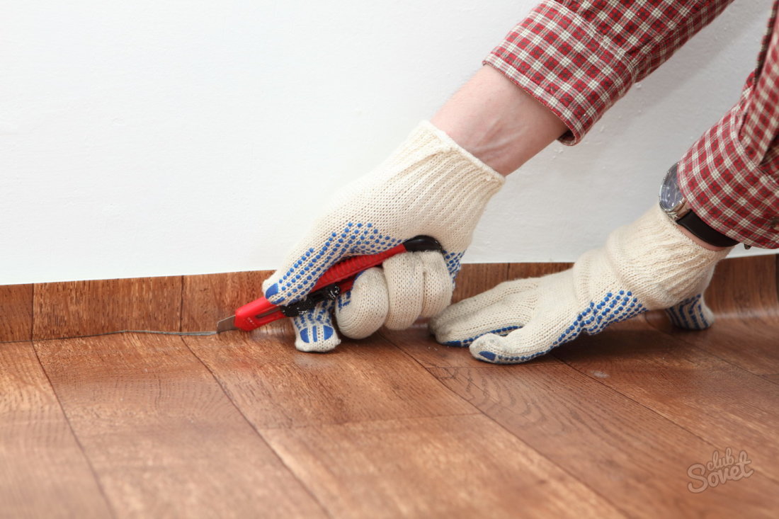 Come laici il linoleum su un pavimento di legno