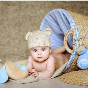عکس چگونه کلاه را برای یک نوزاد متصل کنید