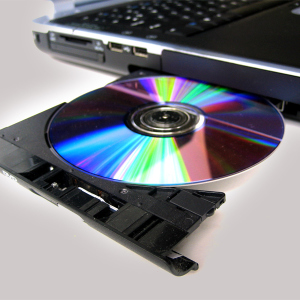 How to open a drive on a laptop without a button